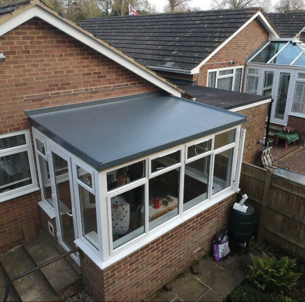 Conservatory with new insulated GRP roof conversion and plastered ceiling